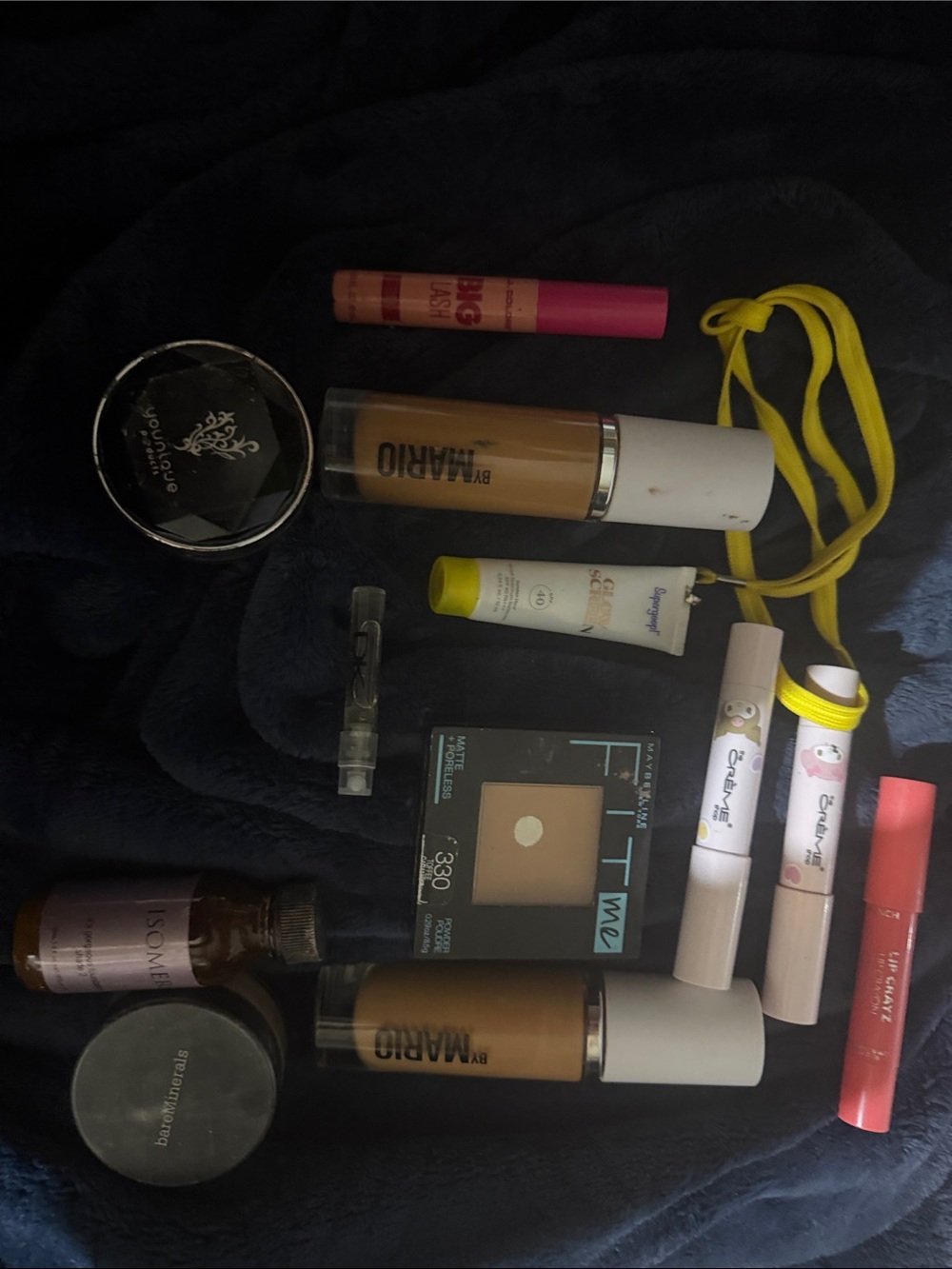 Younique mineral lose powder, several foundations, lip crayon, perfume and more